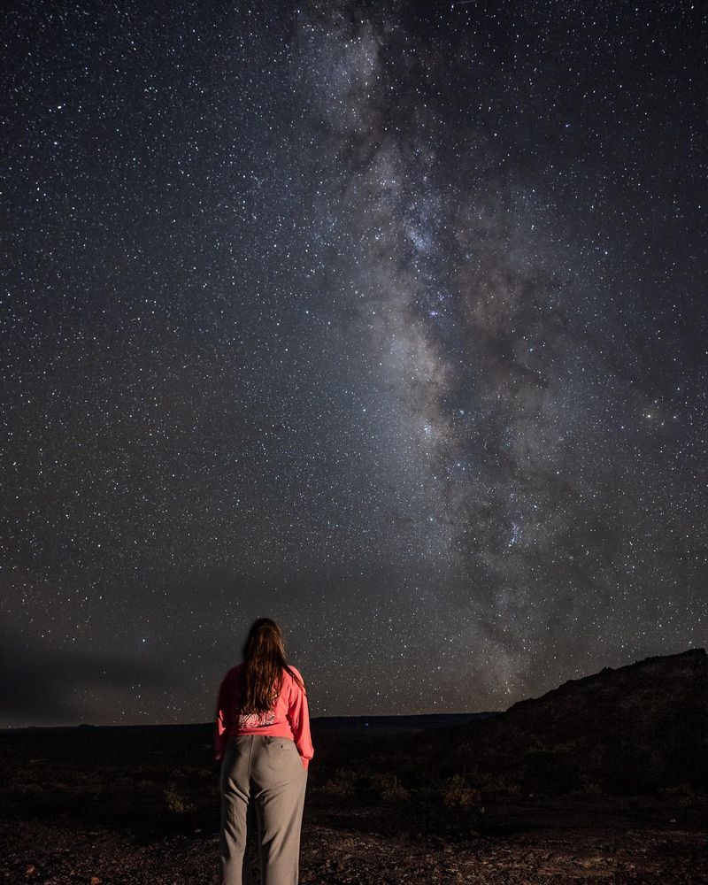 Stargazer under the Milky Way